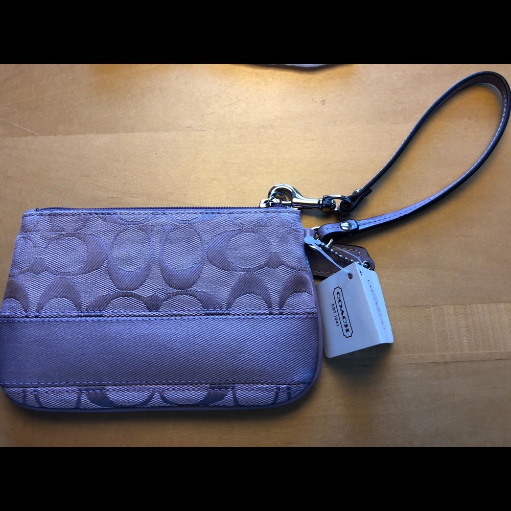 Brand new with tags coach Purple wristlet